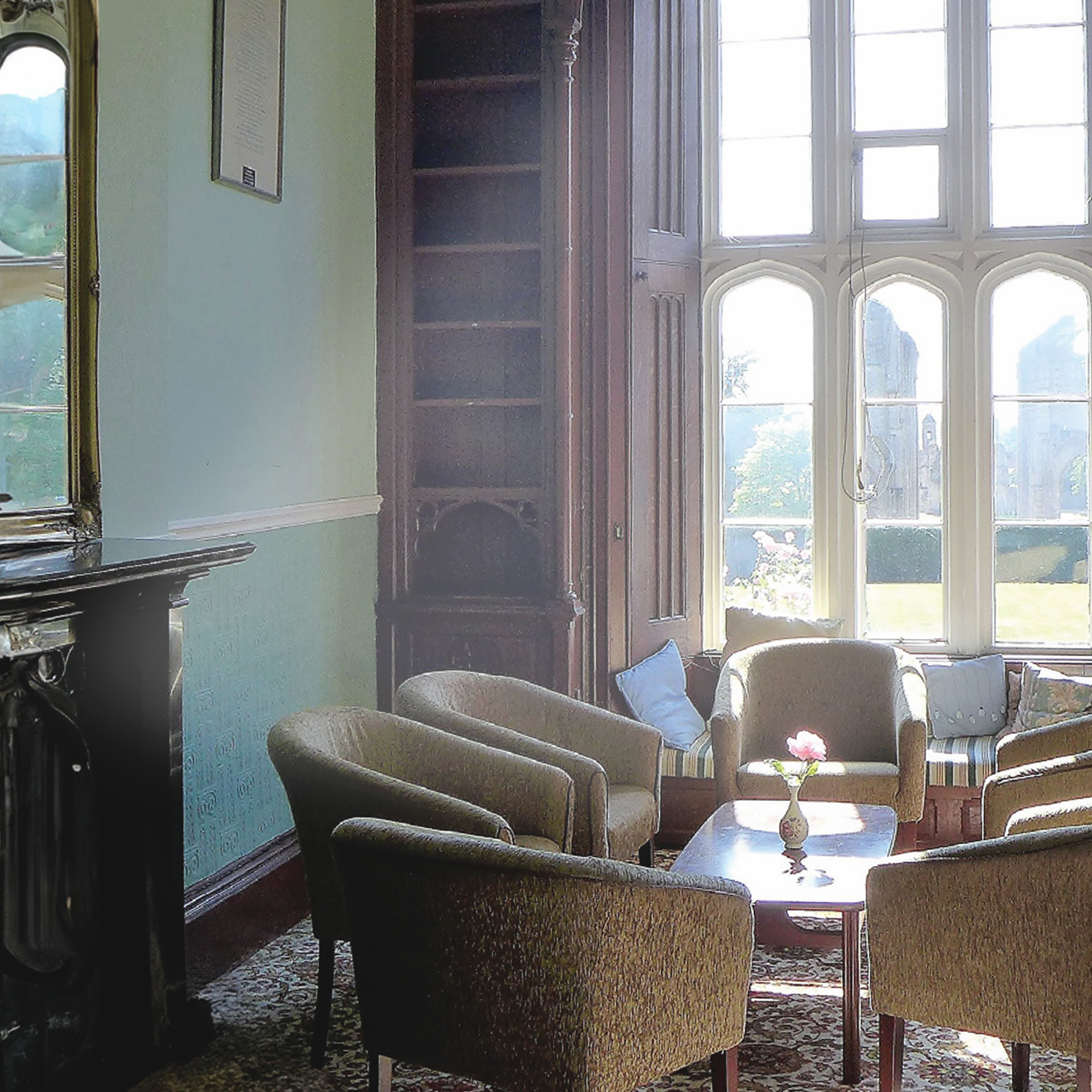 Library seating area with historic windows and Abbey views